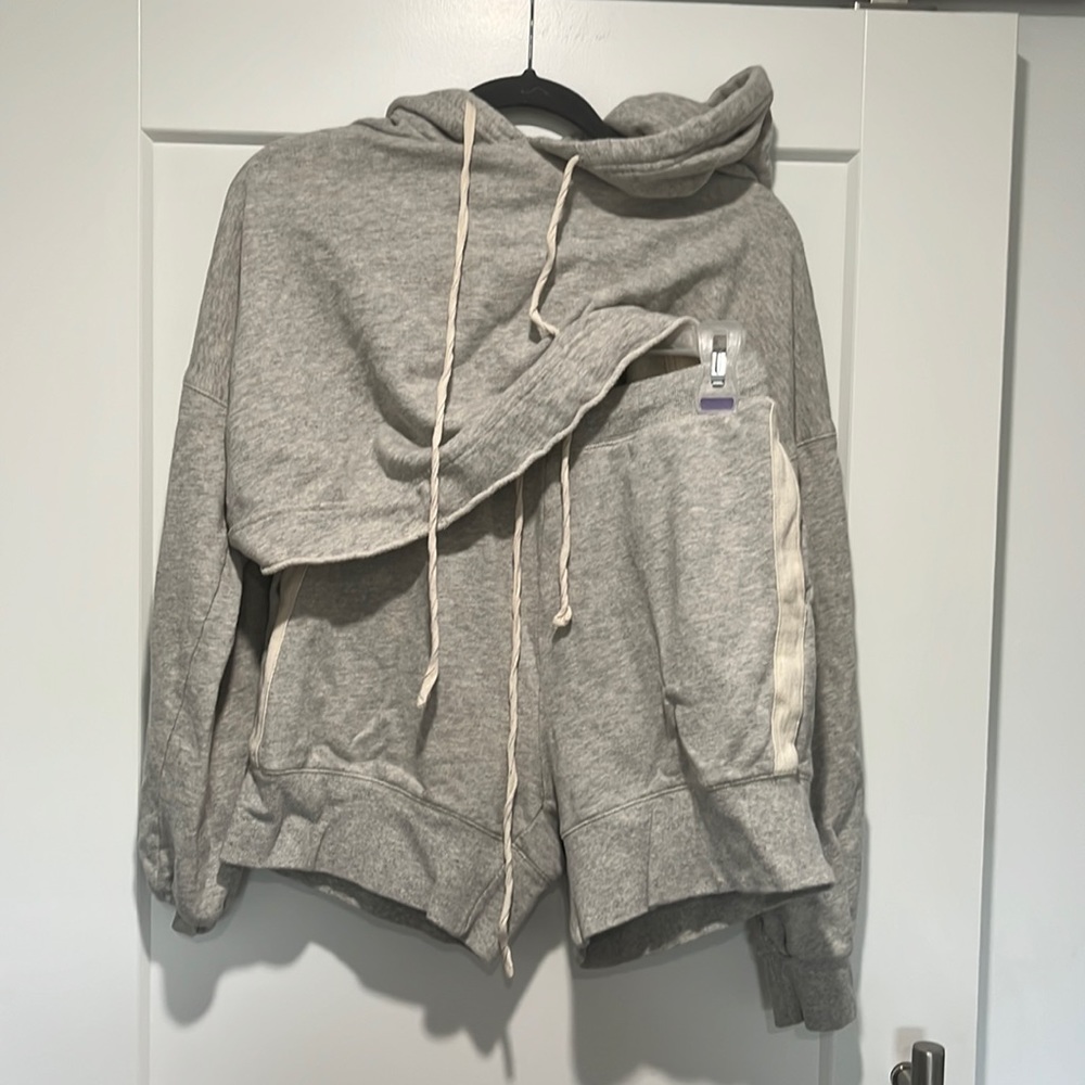 Grey Cropped sweater.  The blue picture represents approx look of the suit on.